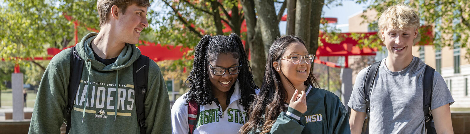 photo of students walking outside on campus