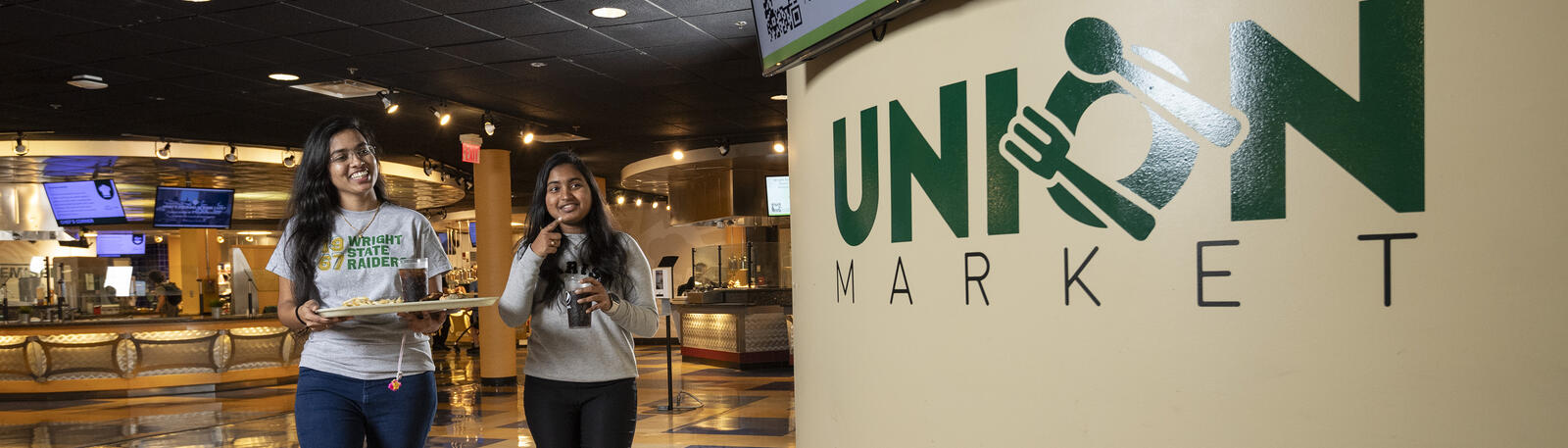 photo of students walking in the union market