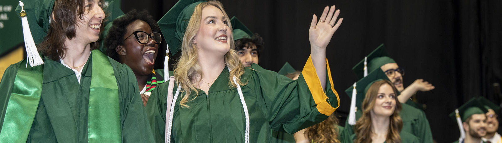 photo of happy graduates at a wright state commencement ceremony