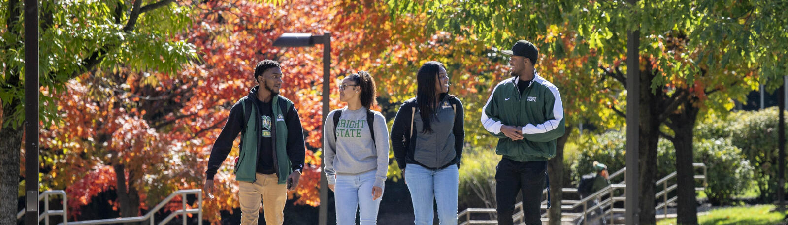 photo of students walking outside on campus