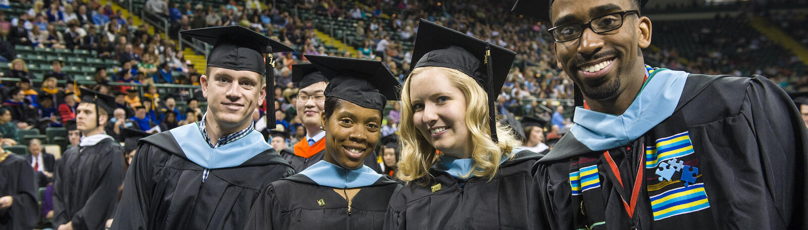 photo of happy graduates at a wright state commencement ceremony