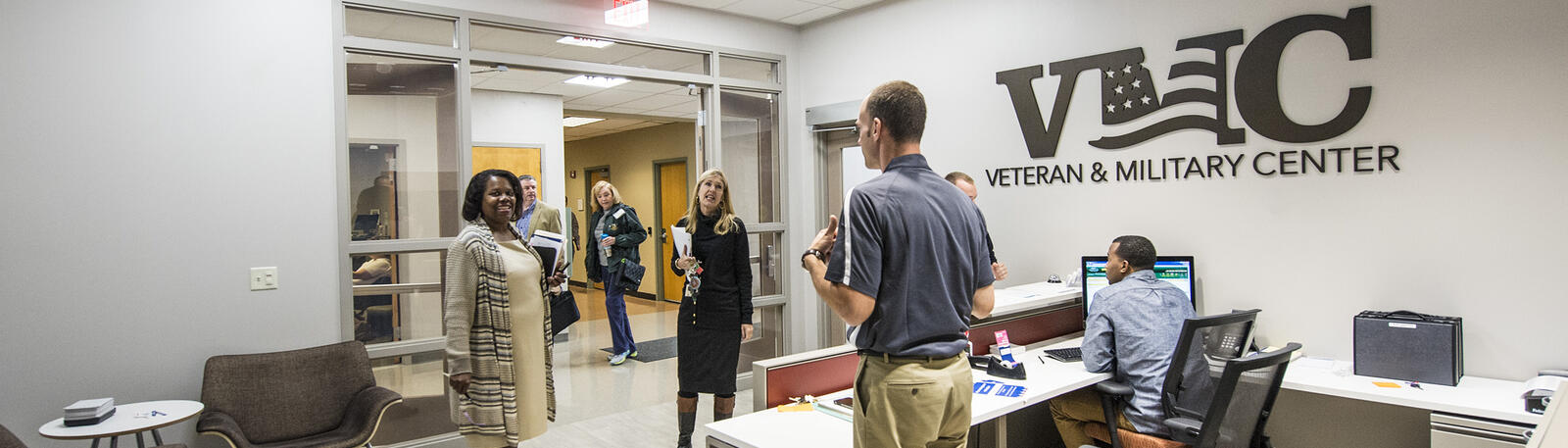 photo of students and visitors in the veteran and military center