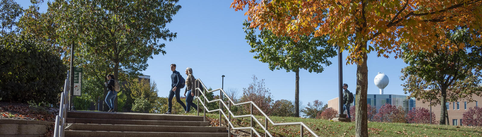 photo of students walking outside on campus