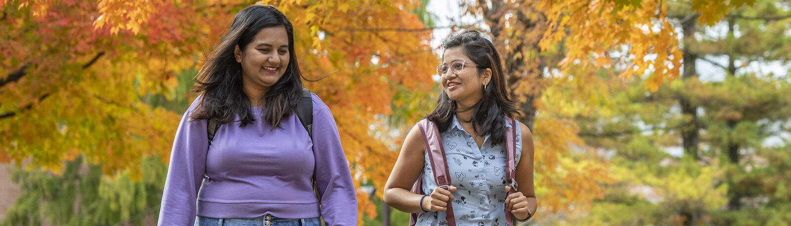 photo of students walking on campus