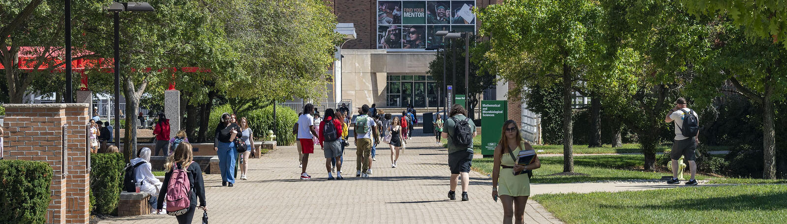 photo of students walking outside on campus