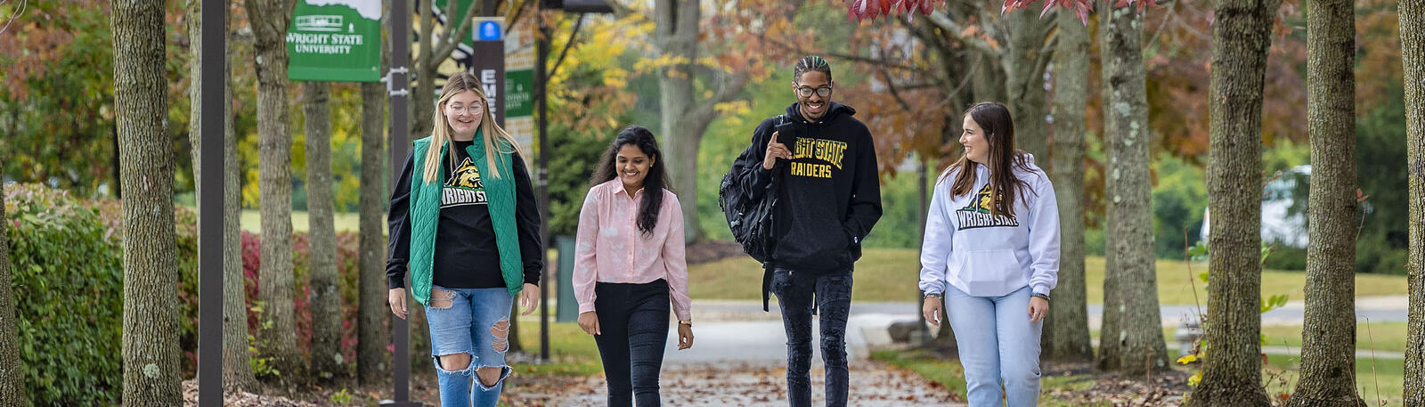 photo of students walking outside on campus