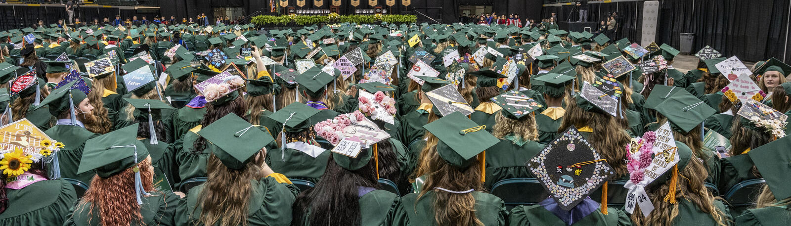 photo of happy graduates at a wright state commencement ceremony
