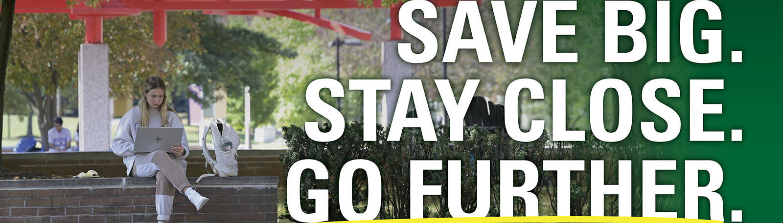 student studying outside on campus with graphic save big stay close go further