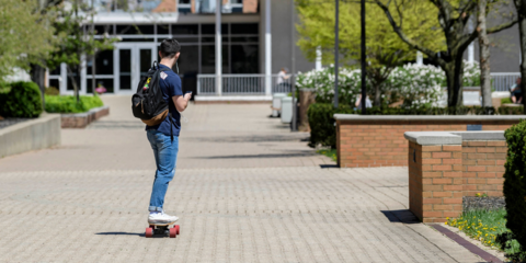 Student on skateboard