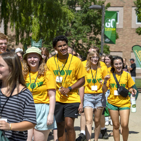 students walking outside on campus during weeks of welcome