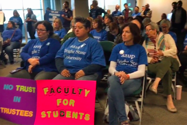 FAculty protesting at board meeting