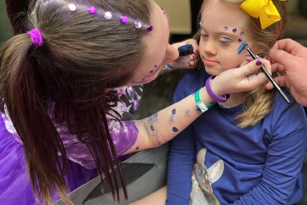 Child getting face painted