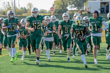 Club Football running out pregame