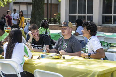 photo of students at a picnic on campus