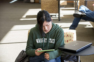 photo of a student using a tablet