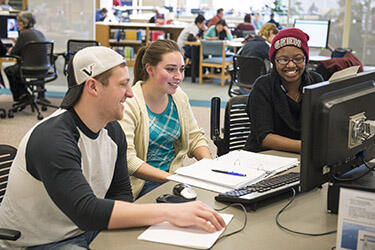 photo of students in the library