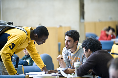 photo of students studying in the library