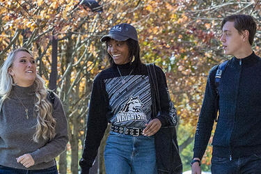 photo of students walking outside on campus