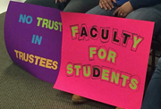 Faculty protest signs