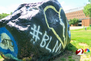 Rock painted with BLM