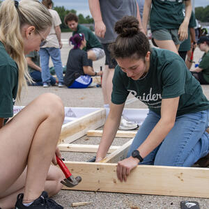 students participating in a habitat for humanity build