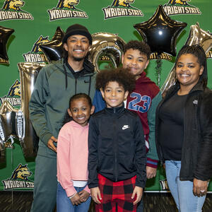 a student and their family posing for a photo at wright state