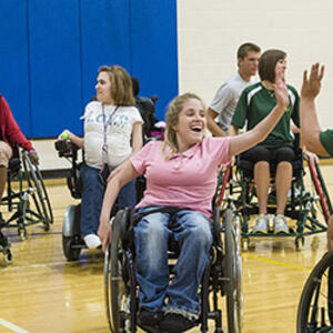 photo of students playing wheelchair basketball