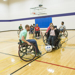Photo of student playing football 