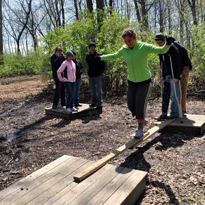 photo of student practicing low ropes courses 