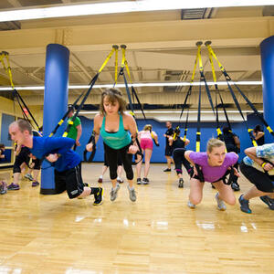 photo of students doing group exercise at studio  