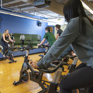 photo of students doing group exercise in studio