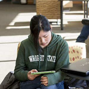 photo of a student using a tablet