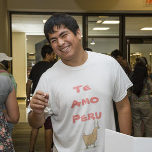photo of a smiling student at an event on campus