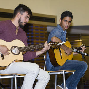 photo of students performing at an event on campus