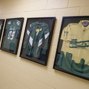 photo of framed intramural sport jerseys in the student union