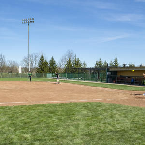 photo of students playing softball